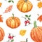 Colorful autumn seamless pattern. Watercolor hand painted pumkins, orange, red and yellow leaves and berries on white background.