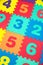 Colorful Baby Mat. Rubber foam pad for children playing. Colorful background ackground with digits.