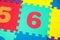 Colorful Baby Mat. Rubber foam pad for children playing. Colorful background ackground with digits.