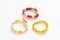 Colorful baby three bracelets on a white background