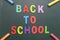 Colorful Back To School alphabet with colorful chalk on blackboard