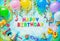 Colorful background with text Happy Birthday from birthday candles