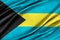 Colorful Bahamas flag waving in the wind.