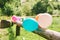 colorful balloons attached to wooden fence, outdoor party concept