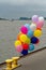 Colorful balloons on quay in Hamburg Blankenese