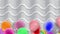 Colorful balloons swaying with the wind. The background is streaked with white fluffy fabric arranged in full space.