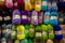Colorful balls of yarn for knitting displayed for sale