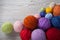 Colorful balls of yarn on a table