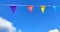 Colorful banner string on blue sky during sunny day. copy space