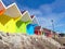 Colorful beach chalets by seaside