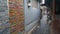 Colorful beaded curtain door in a traditional Chinese hutong.