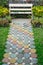 Colorful and beautiful cement blocks in walkway with white chair