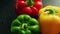 Colorful bell peppers in drops