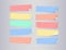 Colorful bended notebook paper sheets for note or message on gray background