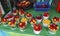 Colorful berry fruit bowls on a green table at a market stall, Medellin, Colombia