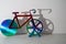 colorful bicycle and visible shadow, creative effect of sunlight, reflection on the wall, mirroring volume, healthy lifestyle