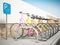 Colorful bicycles in bicycle parking area. 3D illustration