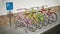 Colorful bicycles in bicycle parking area. 3D illustration