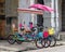 Colorful bicycles with umbrellas for tourists