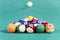 Colorful billiard balls on pool table