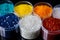 Colorful Biodegradable Plastic Grains Scattered..AI