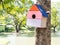 Colorful Bird Houses in the park Hanging on a tree, The bird house was placed at various points.birdhouse forest