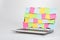 Colorful blank paper memos stuck to a laptop