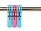 colorful blue pink pastel three big plastic clothespins clip hanging on shiny stainless steel clothesline