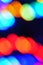 Colorful blurred festive Christmas holidays lights at night