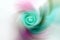 Colorful blurred pastel gradient spiral vortex background. Mint, turquoise, aquamarine, pink, lilac, purple mixed multicolor