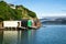 Colorful Boat Sheds with beautiful reflection on daytime  at Duvauchelle, Akaroa Harbour on Banks Peninsula in South Island, New