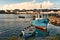 Colorful boats on the shore of Corrib River at Claddagh, Galway, Ireland