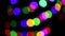 colorful bokeh shimmering background.Lots of Flashing colorful spots background.Multicolored garlands on a black