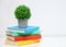 Colorful book on console white table.