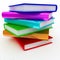 Colorful books stack over white background