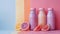 Colorful bottles of smoothies with fresh fruits on a pastel background.