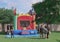 Colorful bounce house in a lake Nona community in Orlando, Florida with parents waiting in front