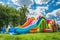 Colorful bounce slide for children entertainment in backyard