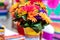 Colorful bouquet of flowers in a painted vase; Fiesta celebration decor