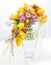 Colorful bouquet of spring flowers in vase