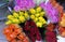 Colorful bouquets of roses close-up. Red, pink, yellow, orange roses. Gifting. Flowers store