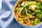 Colorful Bowl with Noodles, Avocado,Broccoli and Edamame Beans. Clean Eating