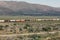 Colorful boxcars on a freight train on the high desert