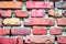 Colorful brick wall fragment close up