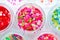 Colorful bright neon decor elements. For makeup, nail art design, manicure and decoration. Confetti, sequins in jars.