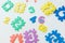 Colorful bright puzzle numbers on white background, education concept