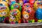 Colorful bright russian nesting dolls Matrioshka in the basket at the street market at Old Arbat street, iconic popular souvenir f