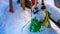 Colorful Brooms On Snow Landscape