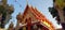 Colorful buddhist temple, red and gold, Thailand.