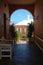 Colorful building through archway in Bermuda